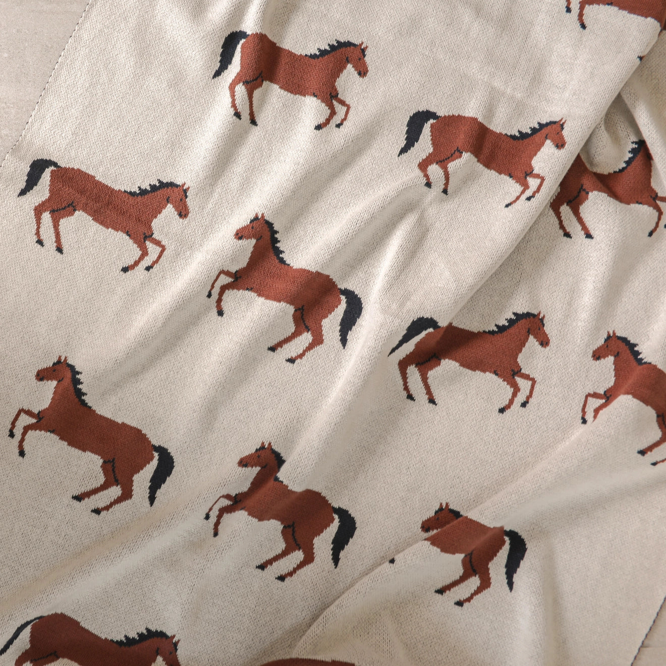 Viverano Organics horse print jacquard sweater knit blanket