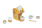 Pearhead wooden coffee play set with yellow coffee maker, two cups, spoon, oat milk, sugar packet, and coffee pods